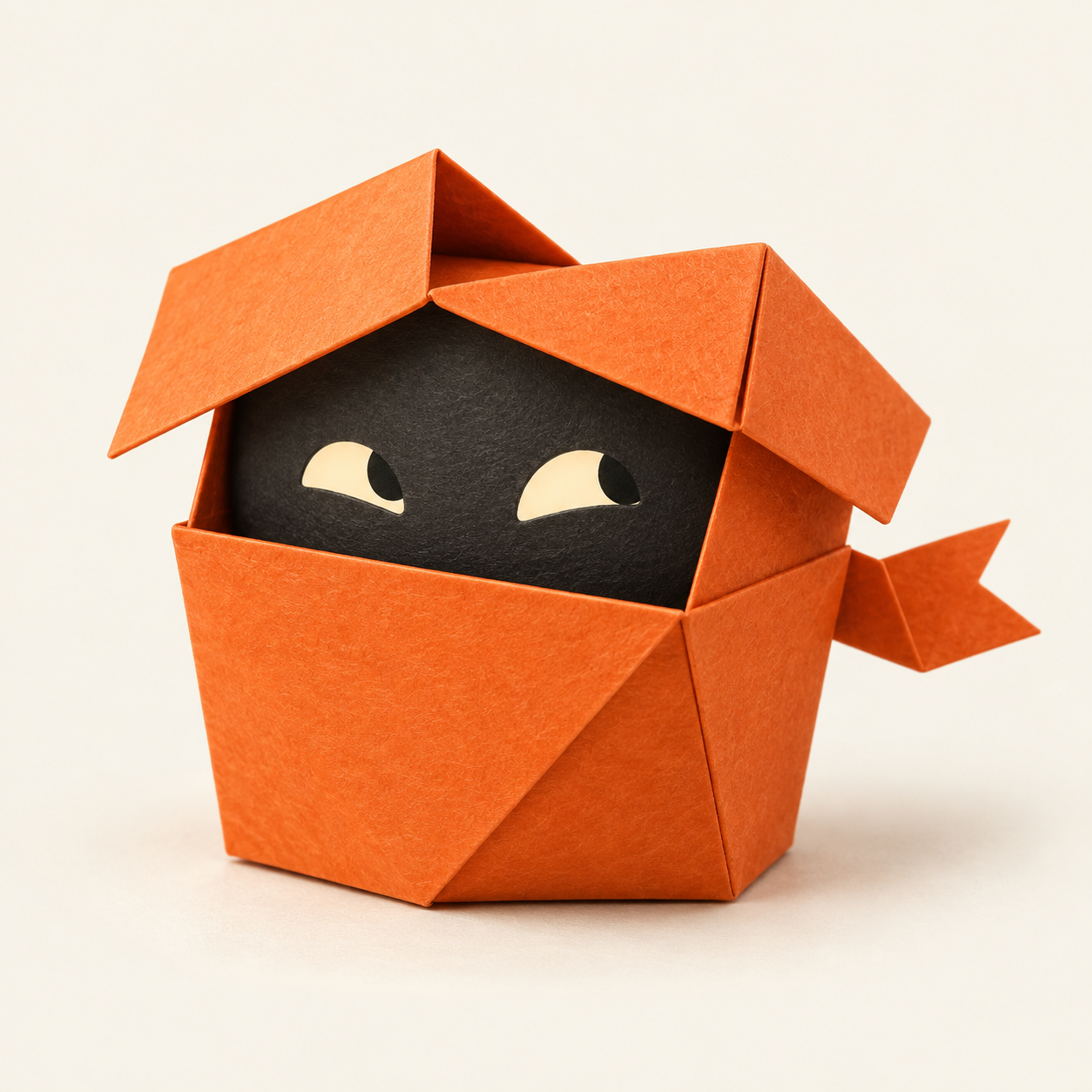 A curious orange paper-box ninja peeks out from under its folded lid.